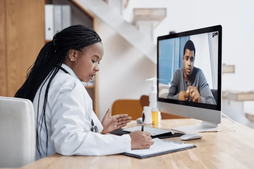 patient consulting with his doctor online