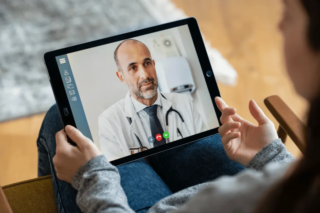 patient having an online consultation with a doctor on their ipad